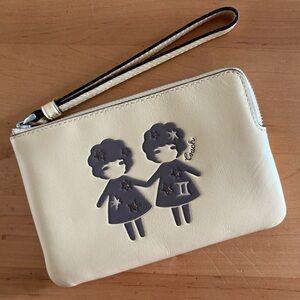 NWT Coach Cream Wristlet with Gemini Design